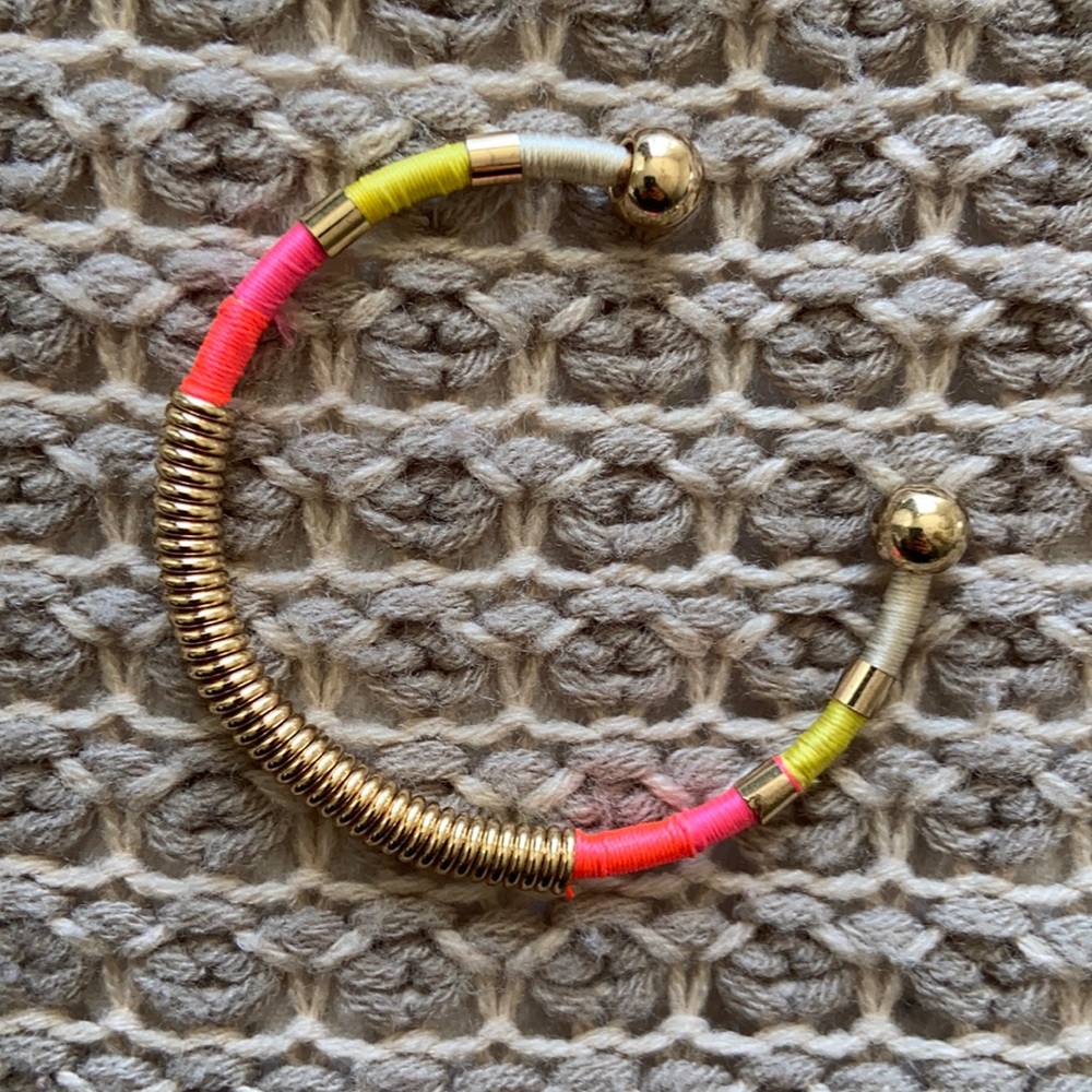 Stretchy cuff bracelet in pink,
yellow and gold
